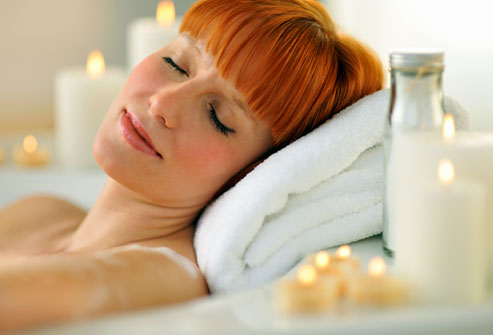 getty_rf_rights_photo_of_woman_soaking_in_tub