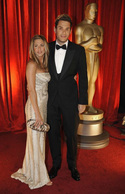 Here's Jennifer Aniston in Valentino couture next to the man we all can't 