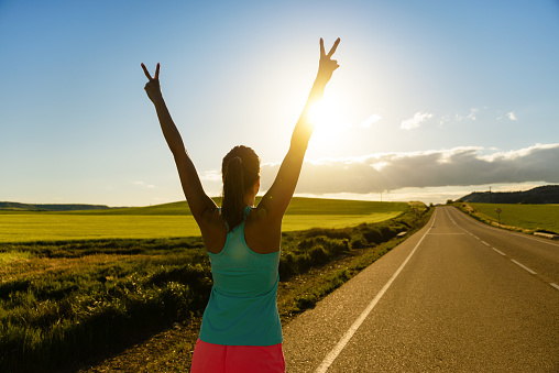 Woman achieving running success and goals