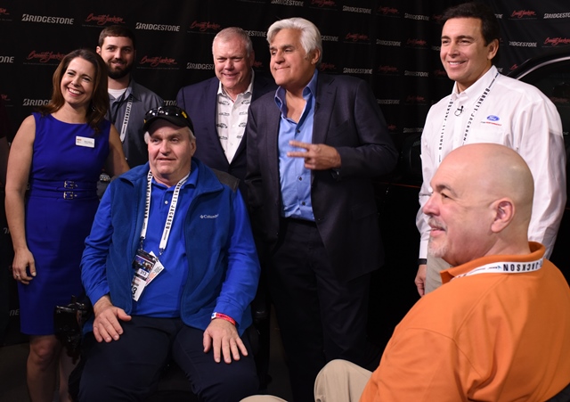 Jay_Leno_with_Craig_Mark_Fields_Pres_and_CEO_Ford_and_Multiple_Sclerosis_reps._Photo_courtesy_Barrett-Jackson.jpg
