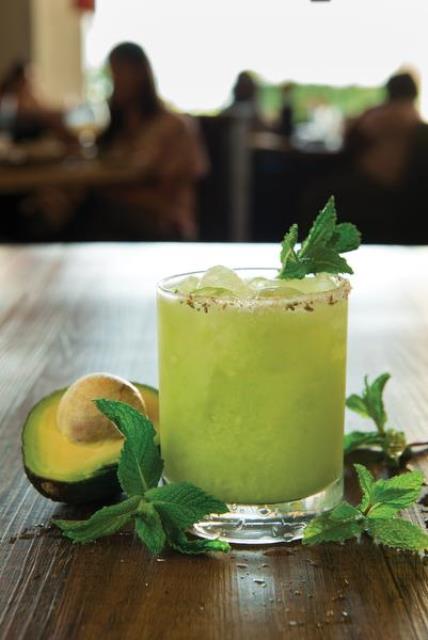 Revamped bar menus at California Pizza Kitchen will sports hand-shaken cocktails like this California Roots drink -- made with Svedka Vodka, fresh avocado and mint, fresh Agave Sour with a fennel salt rim;