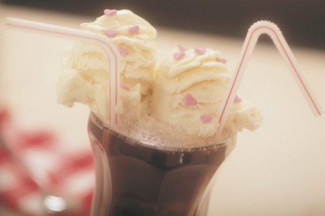 Ice cream soda with drinking straws