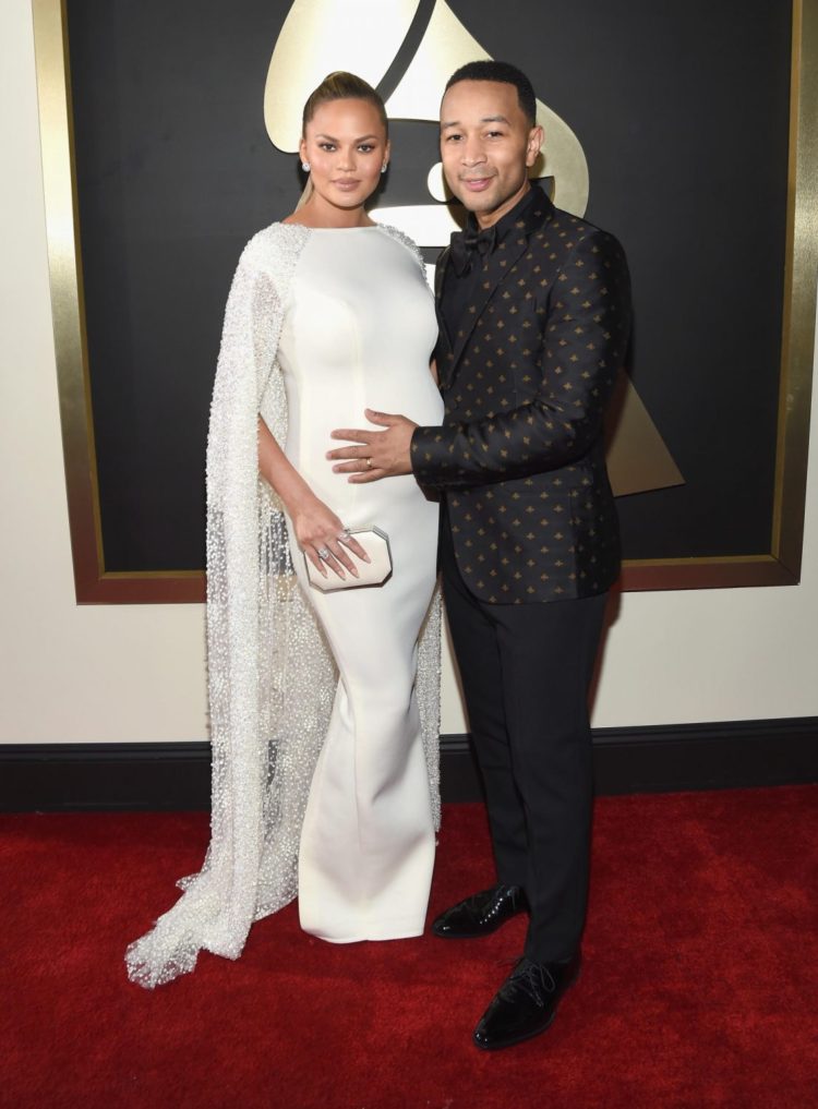 Chrissy Teigan and John Legend / Getty