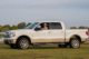 President George W. Bush in his 2009 Ford F-150. Proceeds from its sale benefit the Fisher House Foundation.