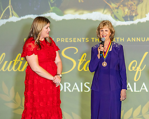 Pat with Anna the Auctioneer