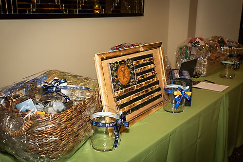 Service Branch Themed Raffle Baskets containing goods and services from veteran owned businesses