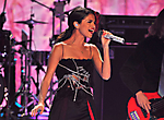 actress Selena Gomez performs onstage.