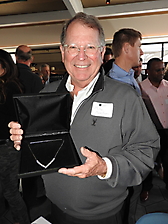 Mike McWilliams, De Rito Partners, and winner of the diamond necklace door prize
