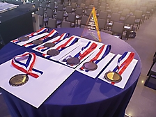 Medals and Founder_s Award on table