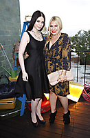 Actress Michelle Trachtenberg and Emily Current 