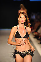 A model walks the runway for Beach Bunny_6