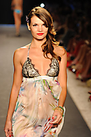 A model walks the runway for Beach Bunny_8