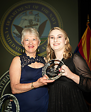 Founder Barbara Hatch presenting Alumni Service Award to Karissa Wenzel