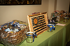 Service Branch Themed Raffle Baskets containing goods and services from veteran owned businesses
