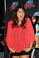daniella monet planet hollywood times square- flowy, loose tops, big smiles