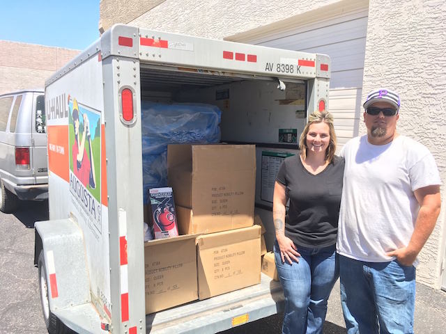 Foster parents with loaded uhaul.jpg