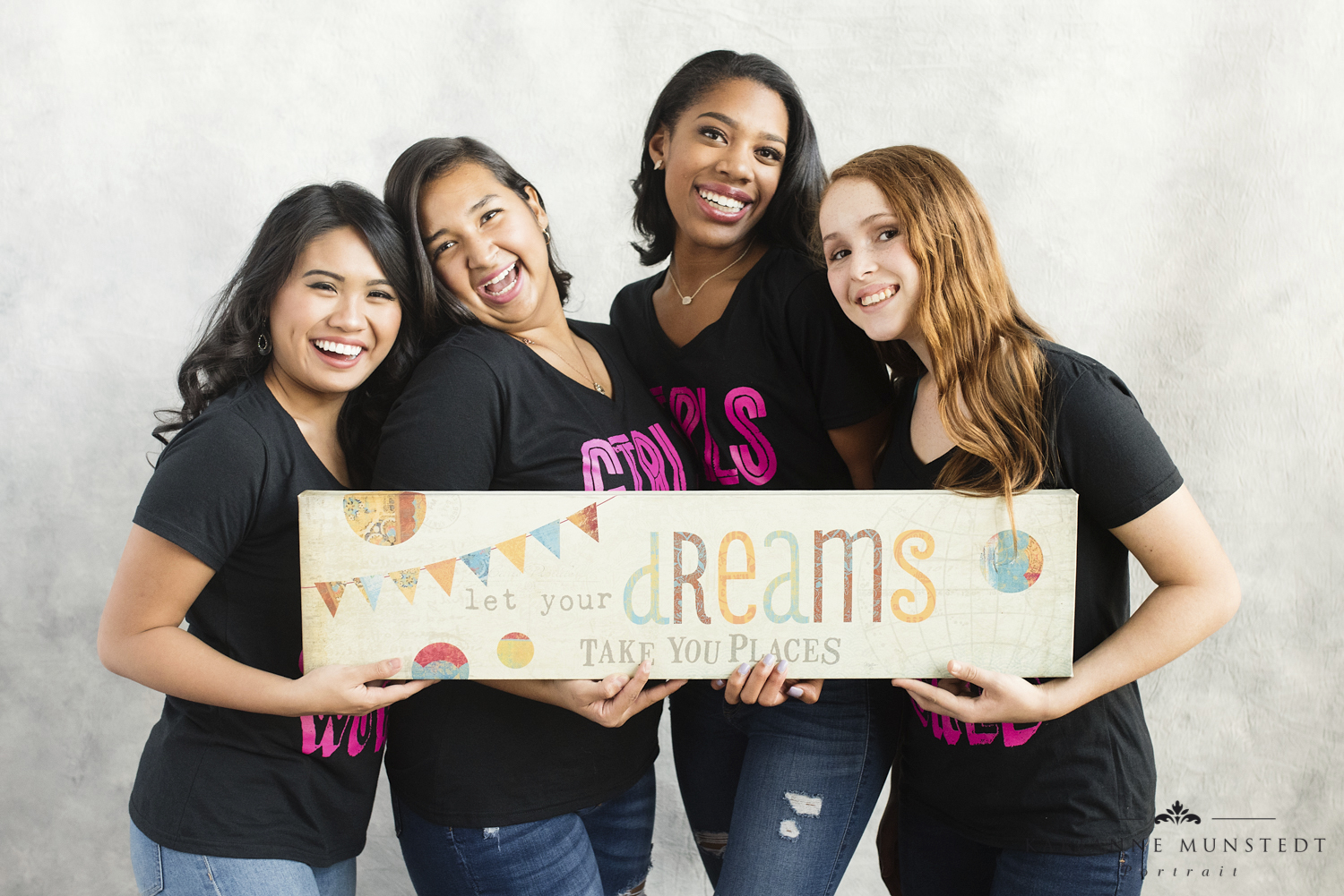 Four Girls Holding Dream Sign - Photo by Anne Munstedt.jpg