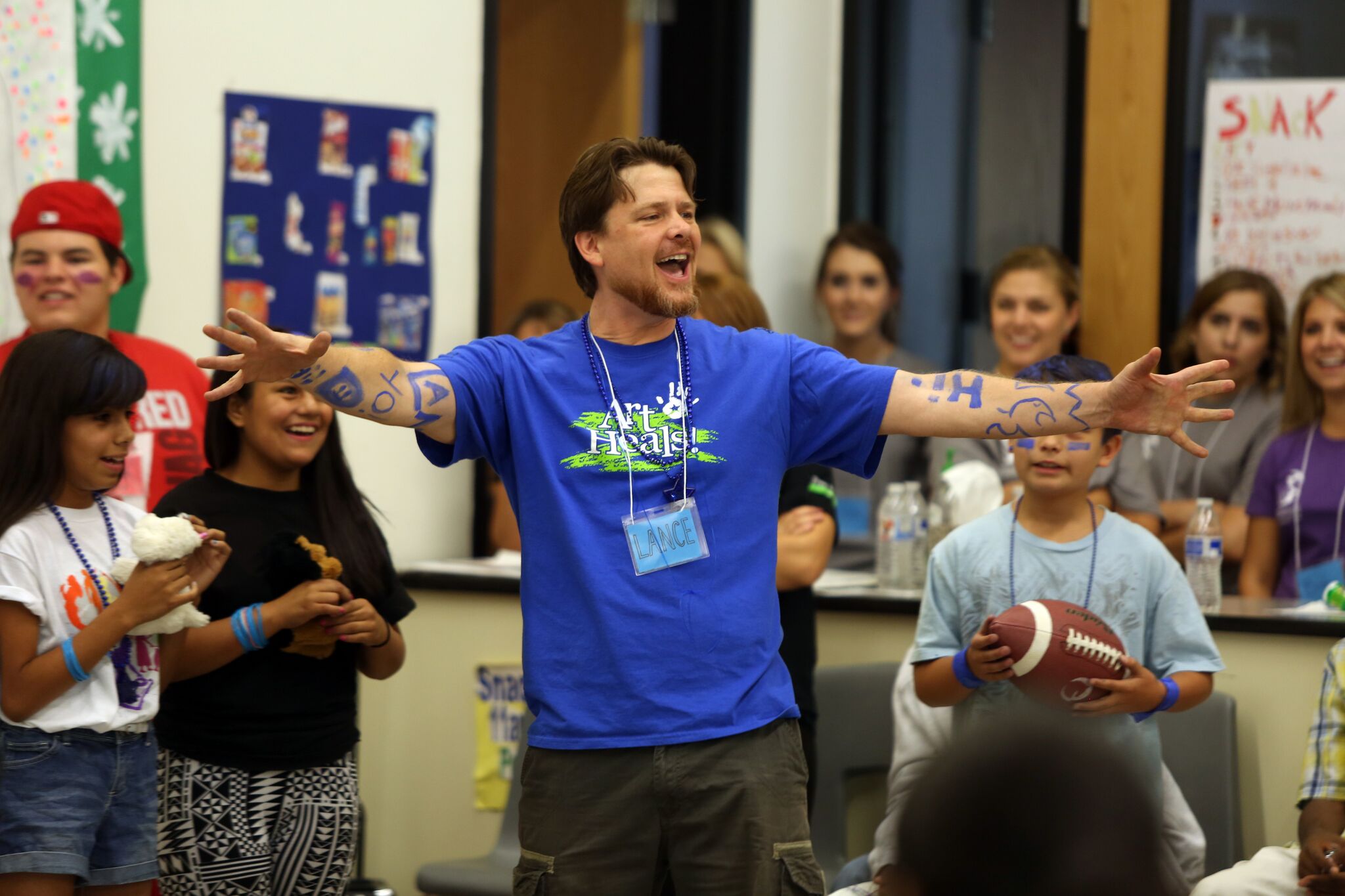 Free Arts mentor Lance Turner performs with the children at Camp 2015 Photo by Lisa Olson