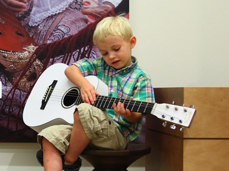 MIM Guitar Playing Child 1