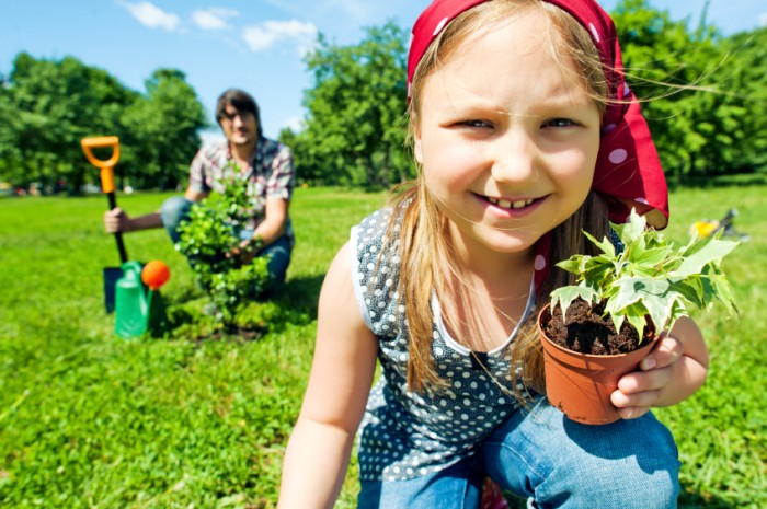 earth-day-activity-girl-planting-tree-700x465.jpg