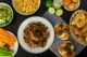Sports feast - chicken wings, vegetable, french fries, pizza